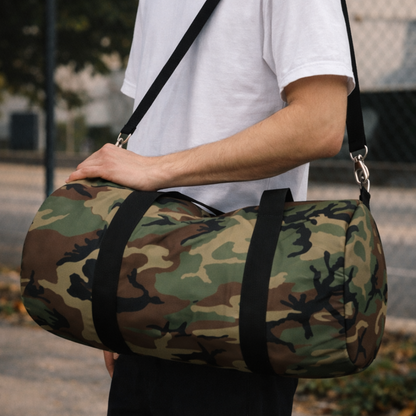 U.S. M81 Woodland camo small duffel bag — polyester Oxford canvas, adjustable shoulder strap, made in USA