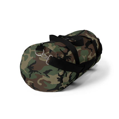 U.S. M81 Woodland camo small duffel bag — polyester Oxford canvas, adjustable shoulder strap, made in USA