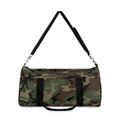 U.S. M81 Woodland camo small duffel bag — polyester Oxford canvas, adjustable shoulder strap, made in USA