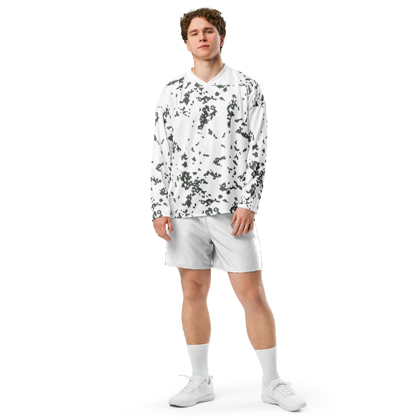 Man wearing a white M05 Snow Camo Hockey Jersey on a white background