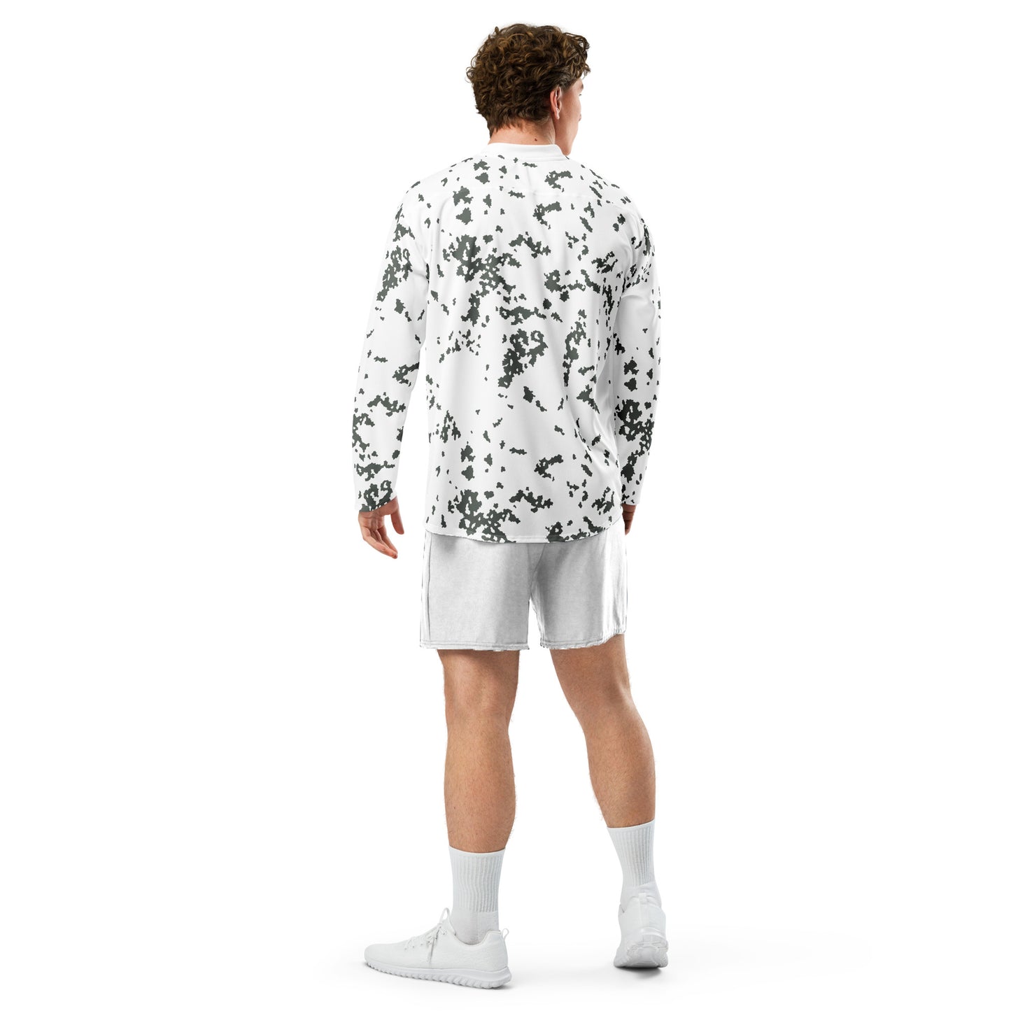 Person wearing a M05 Snow Camo Hockey Jersey and white shorts on a white background